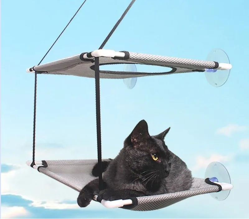 Cat lounging on the Cat Window Hammock
