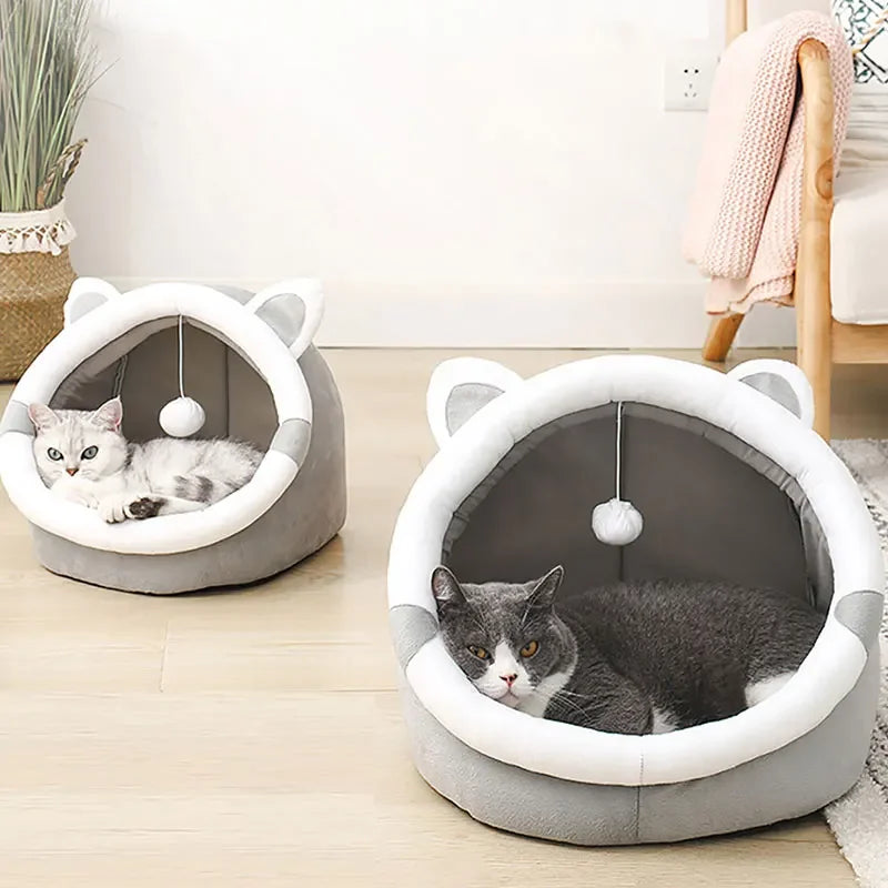 Two Self-Warming Cat Caves side by side