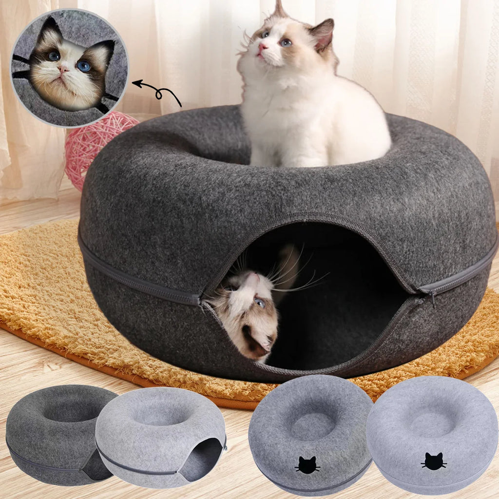 Cat sitting on top of the Felt Cat Cave
